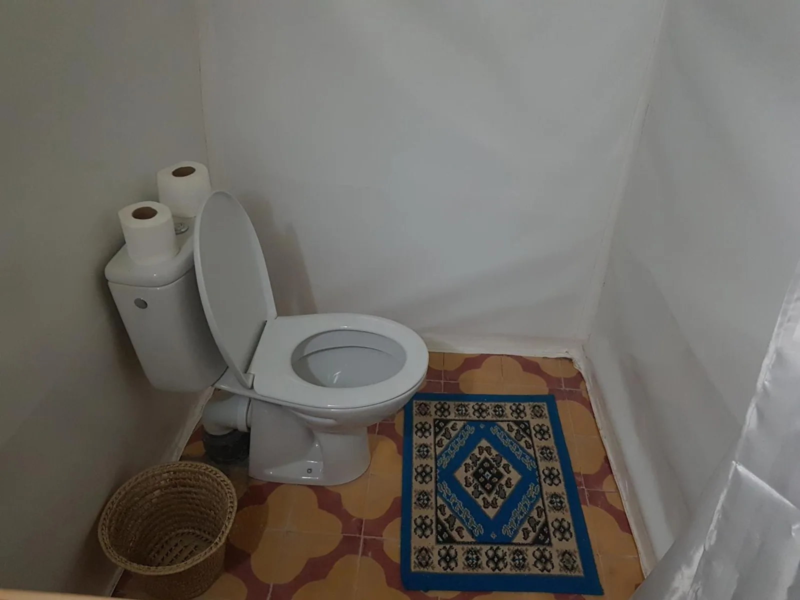 Merzouga Activities Camp private toilet area inside a tent bathroom in Merzouga