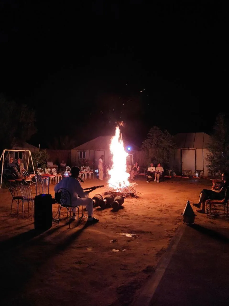 Campfire evening at Merzouga Desert Experience Camp