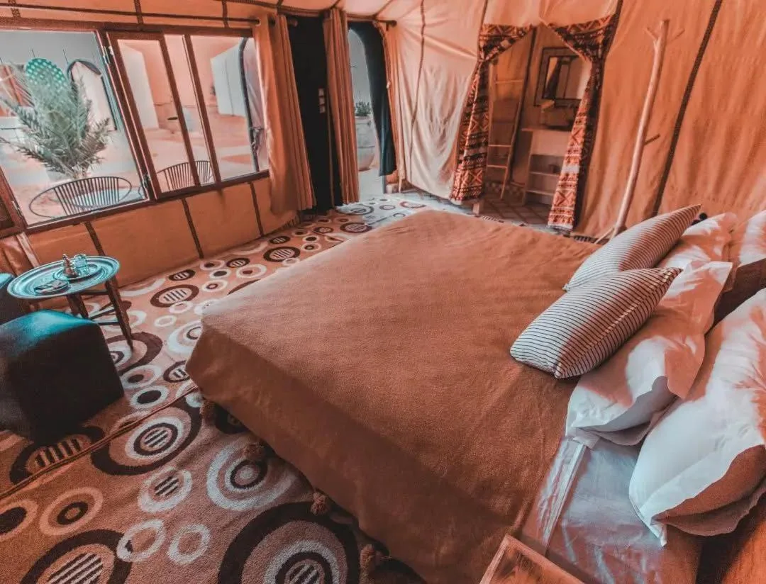 Luxury tent interior at Merzouga Desert Experience Camp