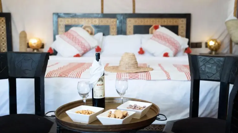 Breakfast setup in a luxury tent suite at Merzouga Luxe Camp in Merzouga, Morocco