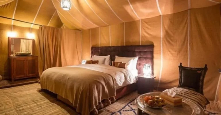 Cozy tent bedroom at Merzouga Luxury Magic Nights