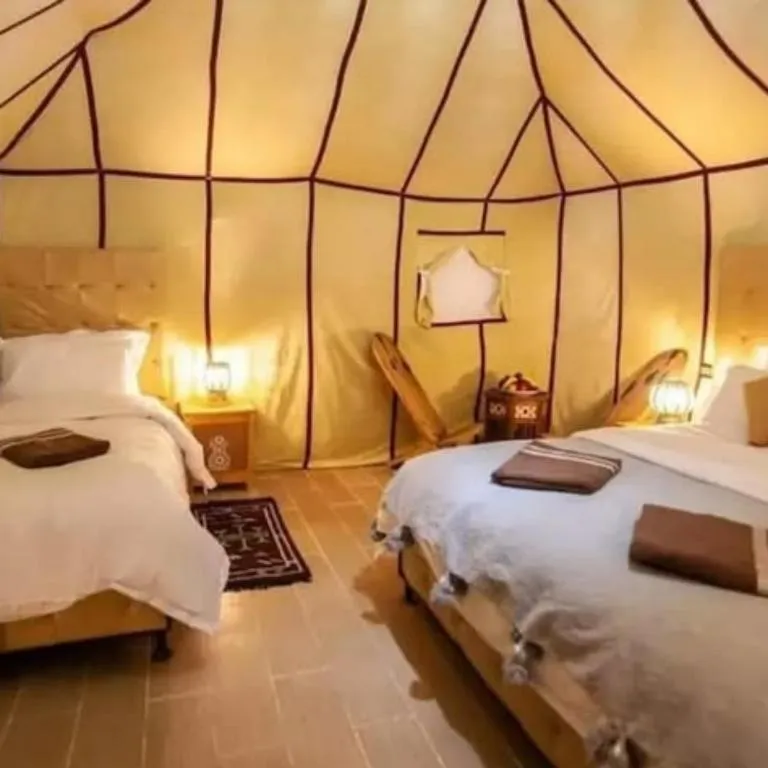 Guest tent setup at Merzouga Nomads Camp