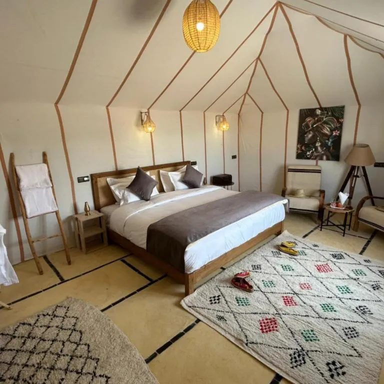 Interior of a luxury tent at Merzouga Nomads Camp