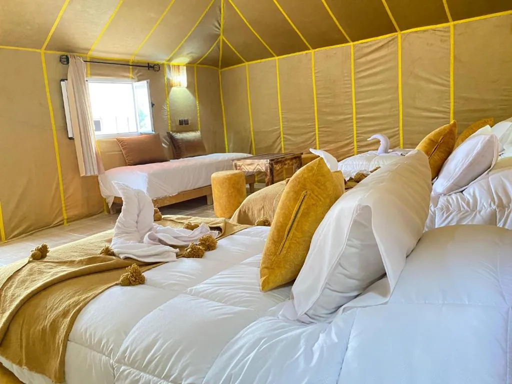 Well-designed guest tent at Merzouga Nomads Camp