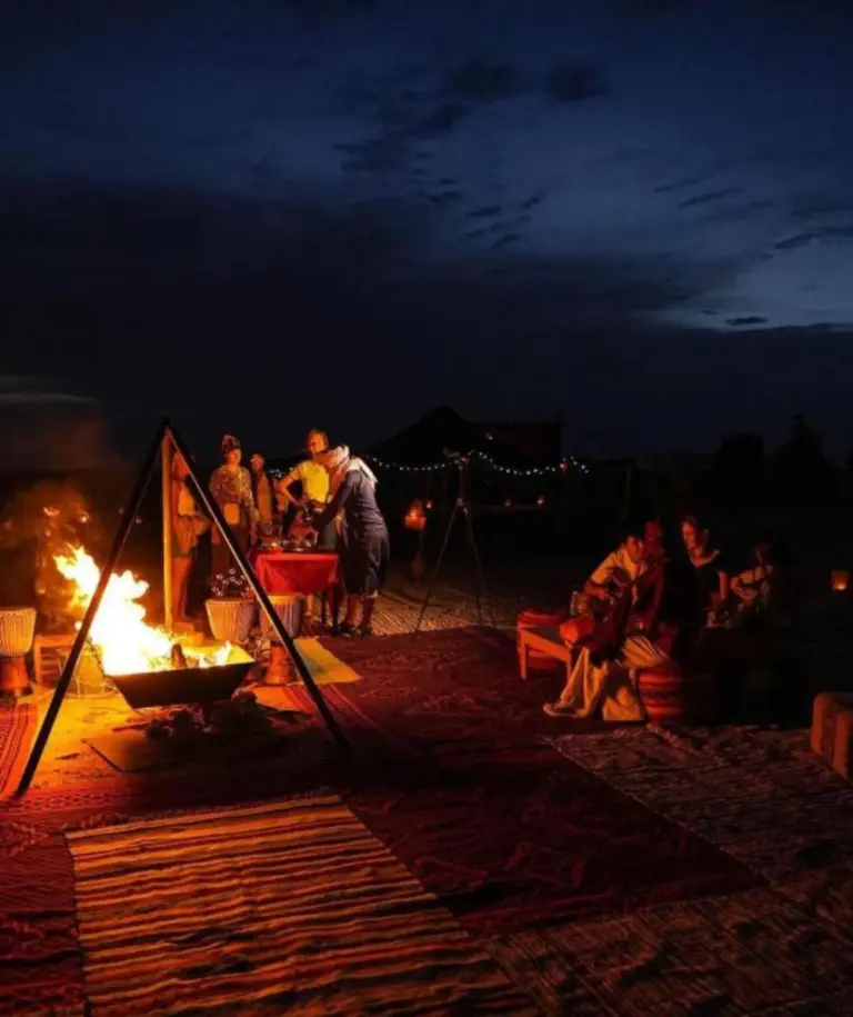 Evening campfire at Retreat Sahara Luxury Camp
