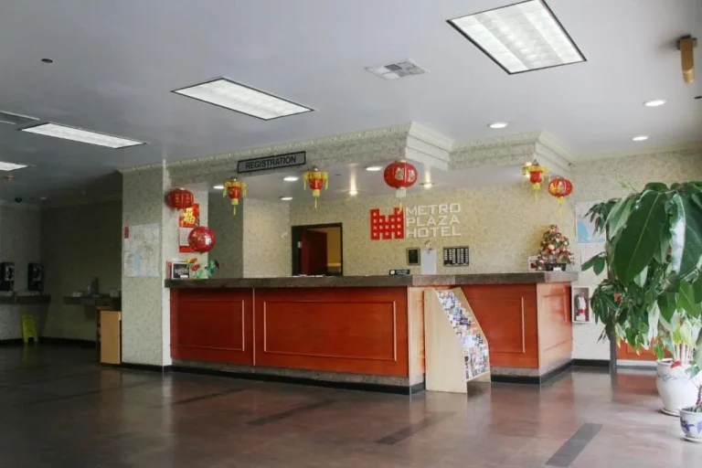 Metro Plaza Hotel reception area with registration desk