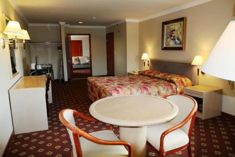 Second guest room in Metro Plaza Hotel showing bed and furniture