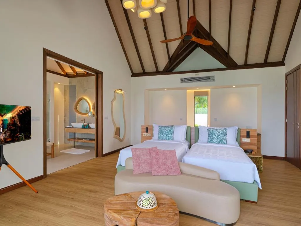 Spacious family suite at Meyyafushi Maldives with two beds