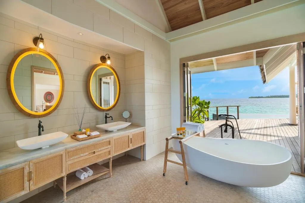 Stylish bathroom at Milaidhoo Maldives with ocean view