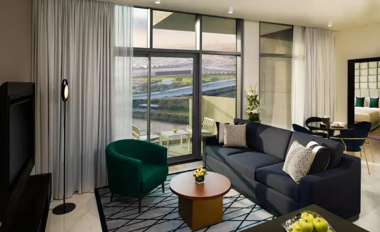 Millennium Atria Business Bay Dubai bedroom with king bed, window view, and modern decor