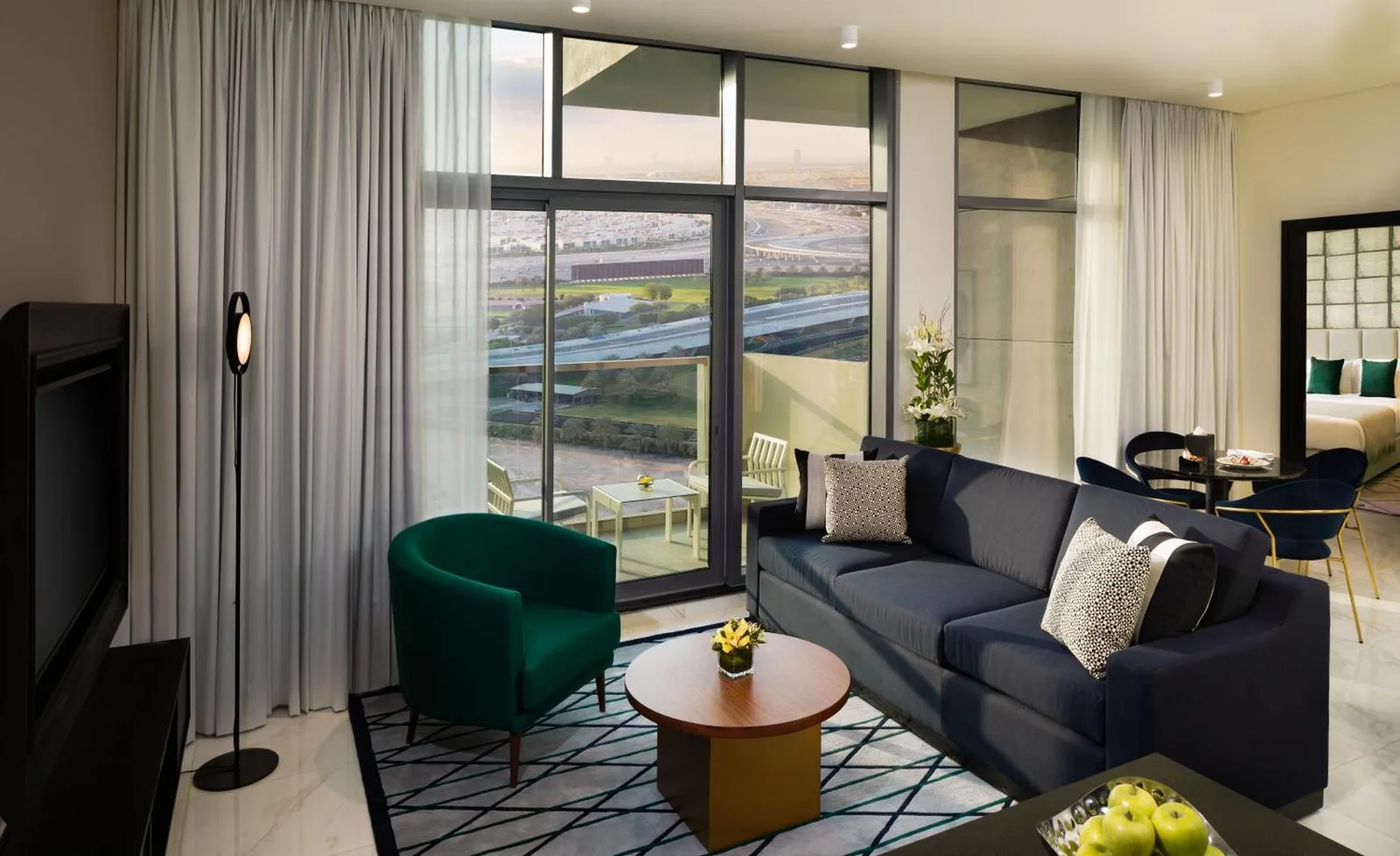 Millennium Atria Business Bay Dubai bedroom with king bed, window view, and modern decor