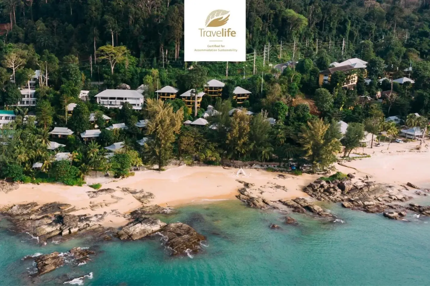 Aerial view of Moracea by Khao Lak Resort in Khao Lak overlooking the beach and tropical coastline