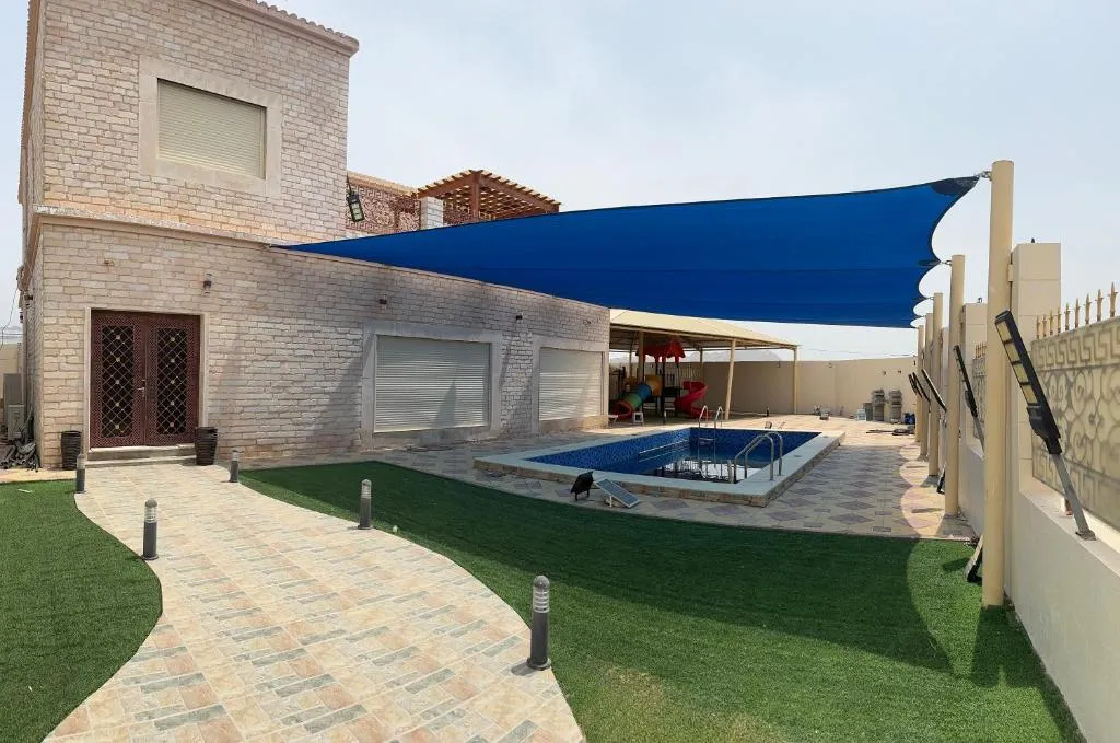 Mount Hut exterior view with shaded seating in Dubai