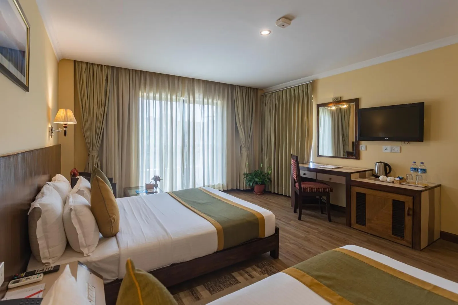 Bright twin room at Mount Kailash Resort