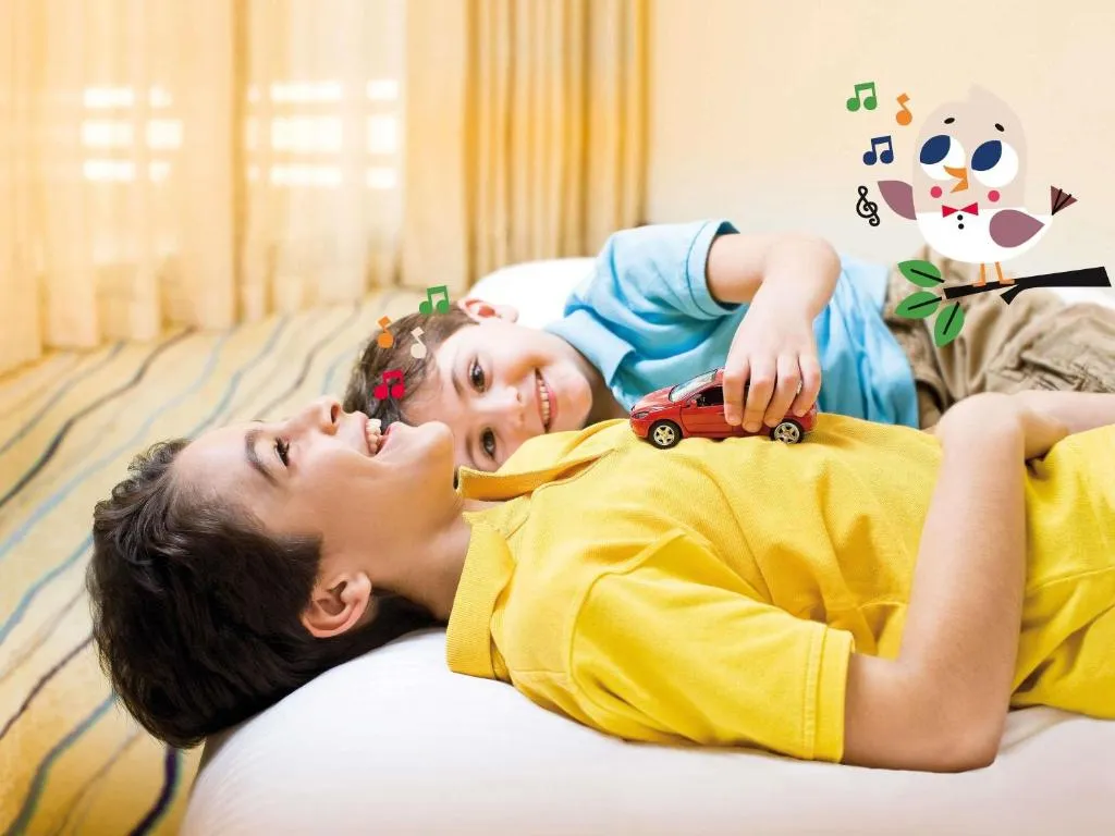 Children playing in Family Suite at Mövenpick Hotel Sukhumvit 15 Bangkok