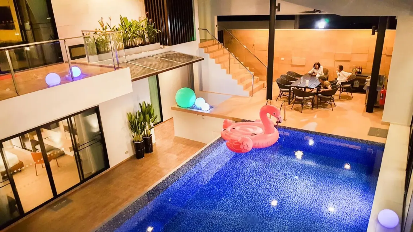 Movenpick Pool Villa by Angkana poolside dining area at night