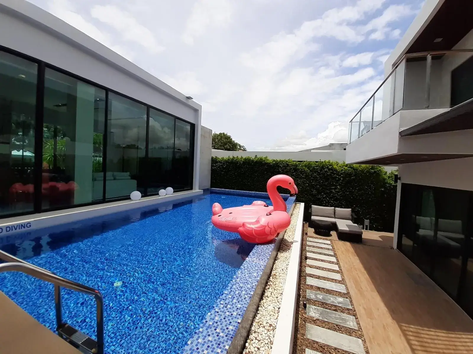 Movenpick Pool Villa by Angkana pool with pink flamingo float