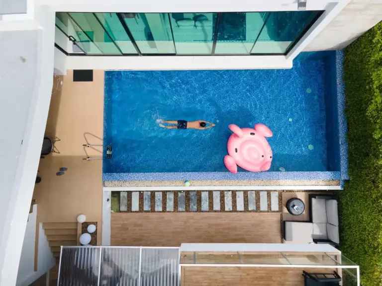 Movenpick Pool Villa by Angkana pool with swimmer and pink float