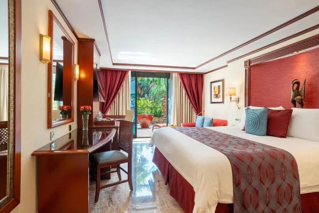 Deluxe room at Nairobi Serena Hotel with vibrant interior and outdoor access