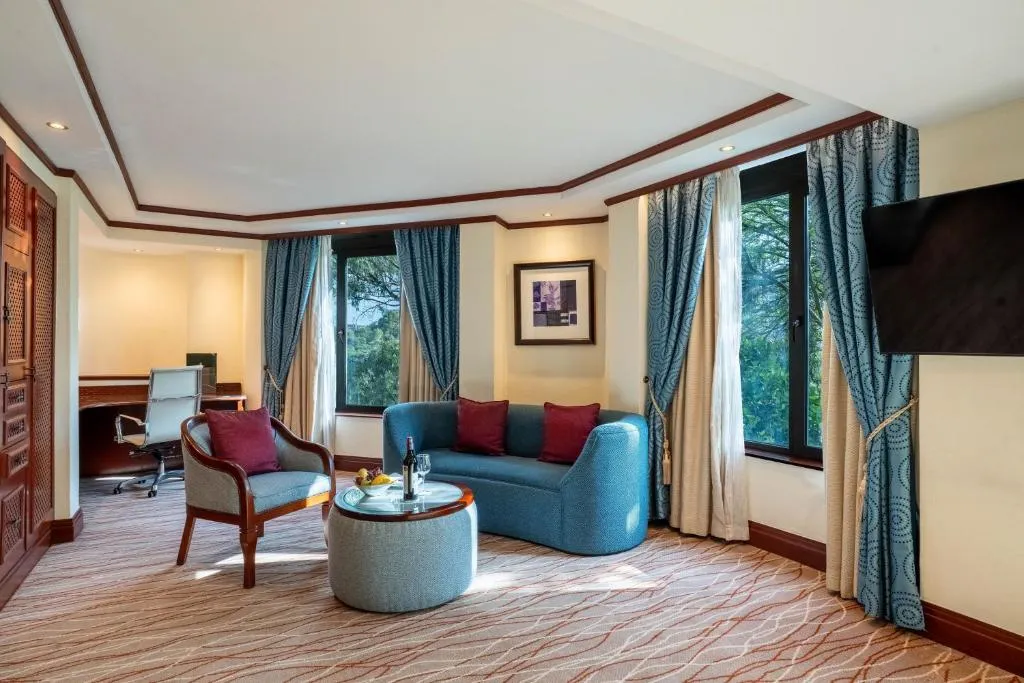 Spacious living area in a suite at Nairobi Serena Hotel with comfortable seating