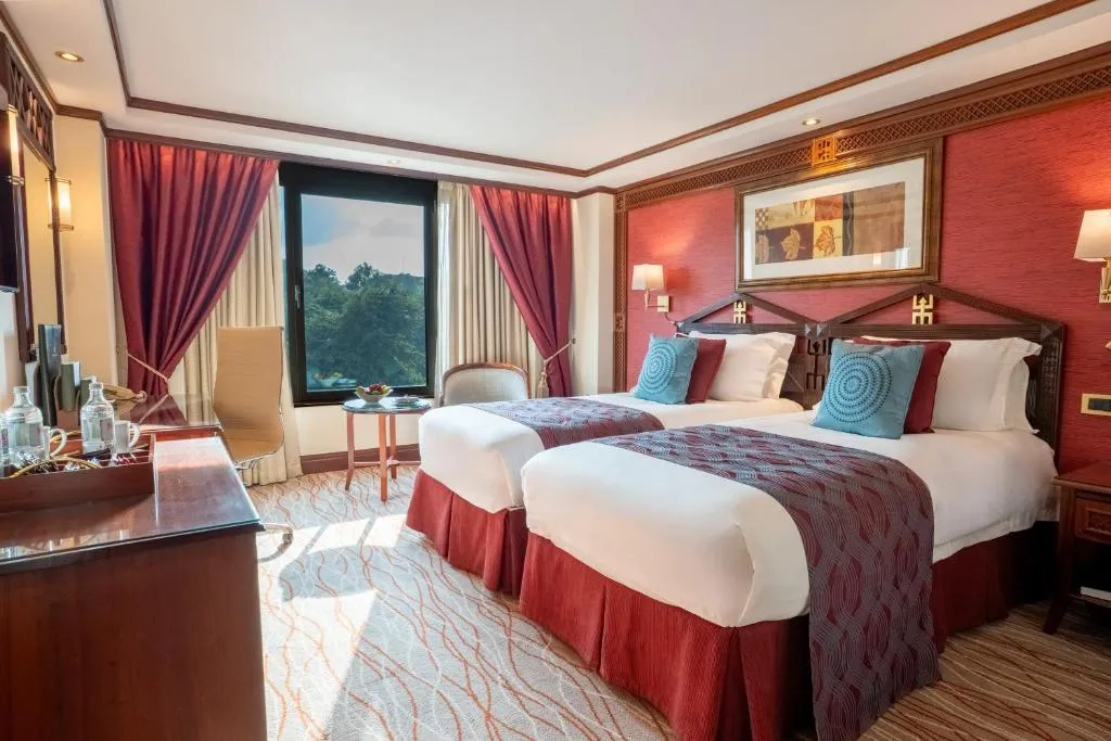 Twin-bedded room at Nairobi Serena Hotel offering comfortable accommodations
