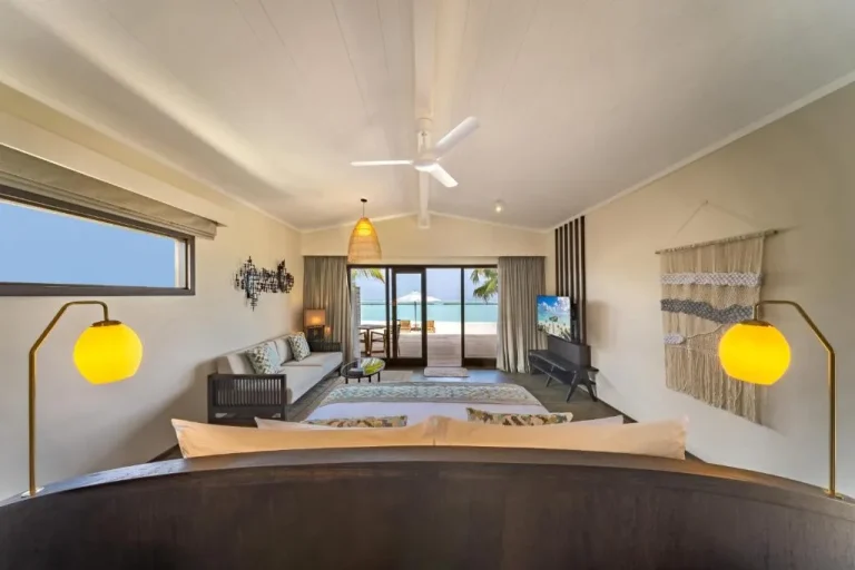Living room at Nala Maldives with ocean view.