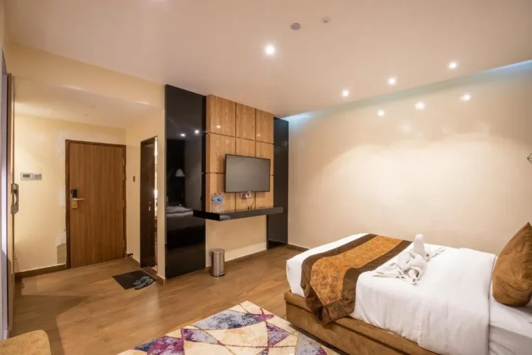 Habitación acogedora del Nansc Hotel con comodidades modernas