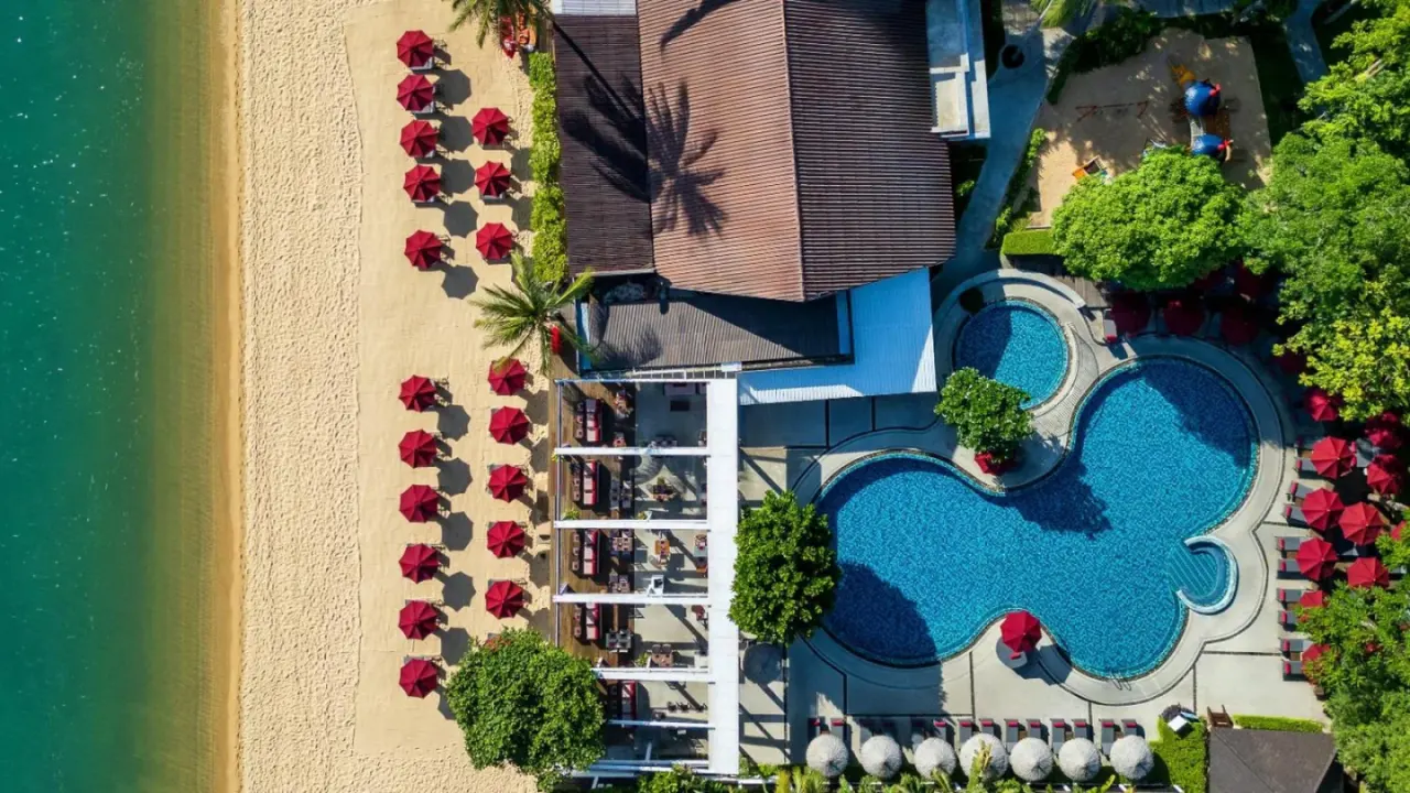 Aerial view of NH Collection Samui Peace Resort pool and beach