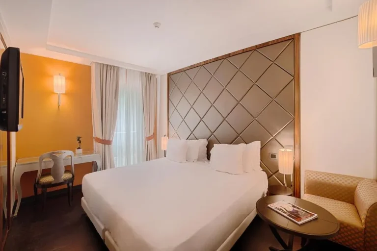Stylish bedroom at NH Collection Taormina