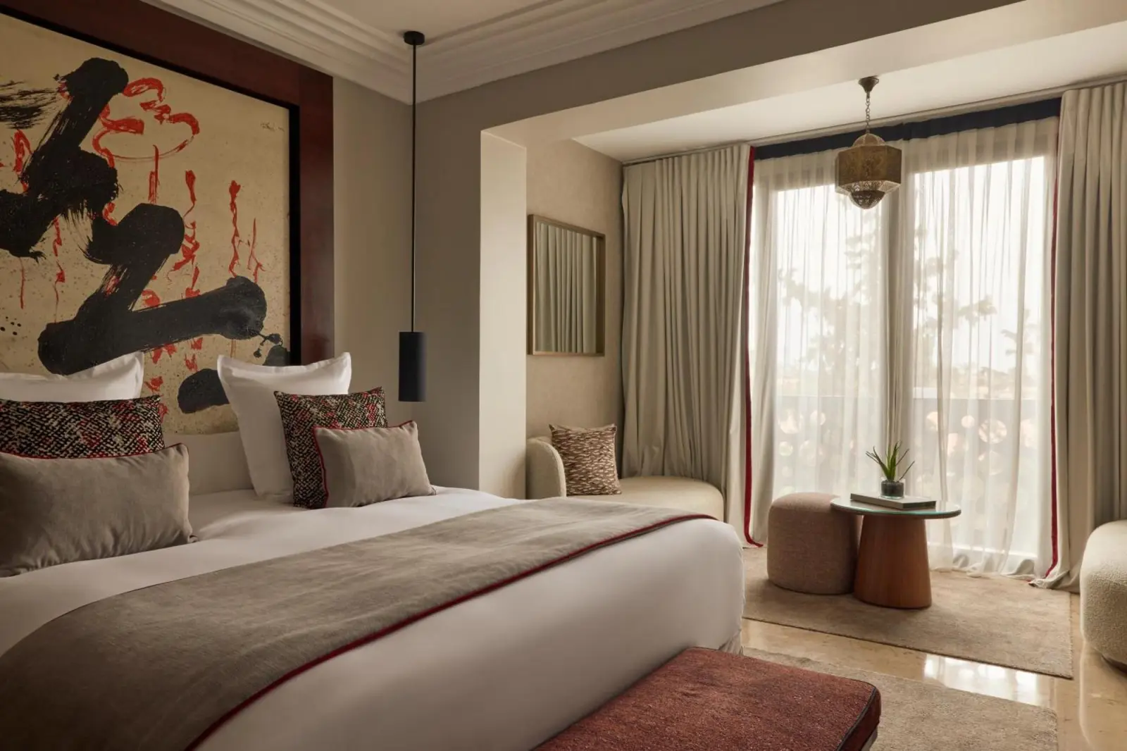 A beautifully designed guest room at Nobu Hotel Marrakech showcasing modern Moroccan decor.