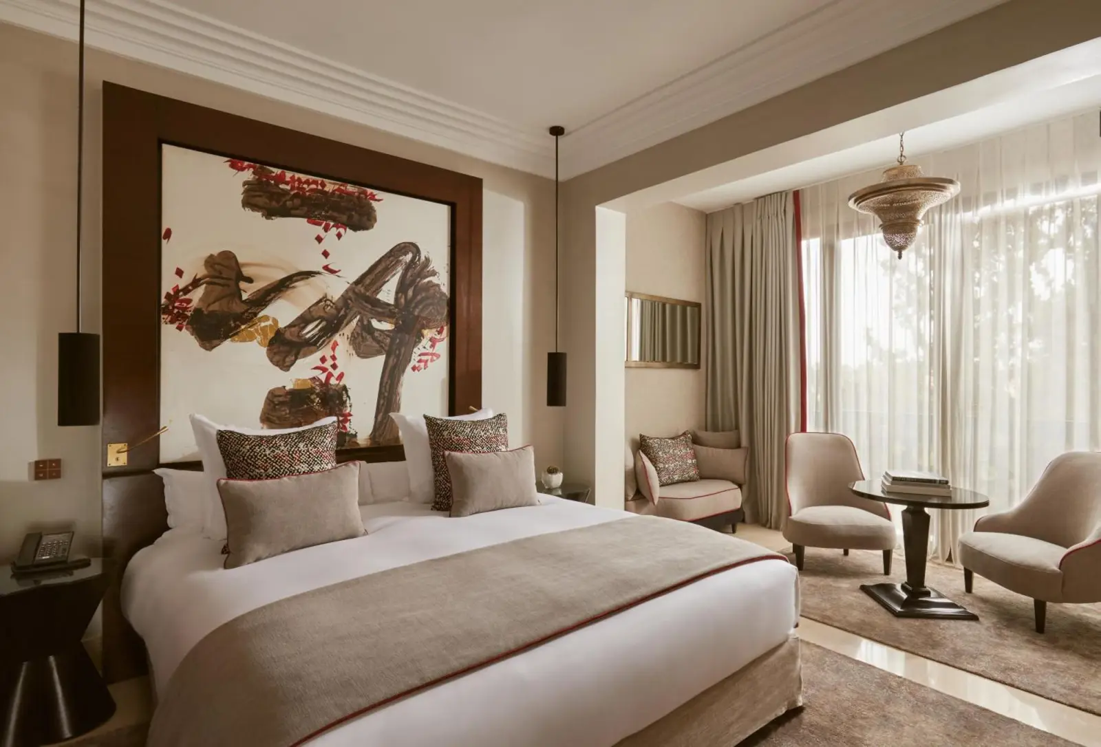 Another view of a stylish guest room in Nobu Hotel Marrakech, emphasizing the artistic decor.