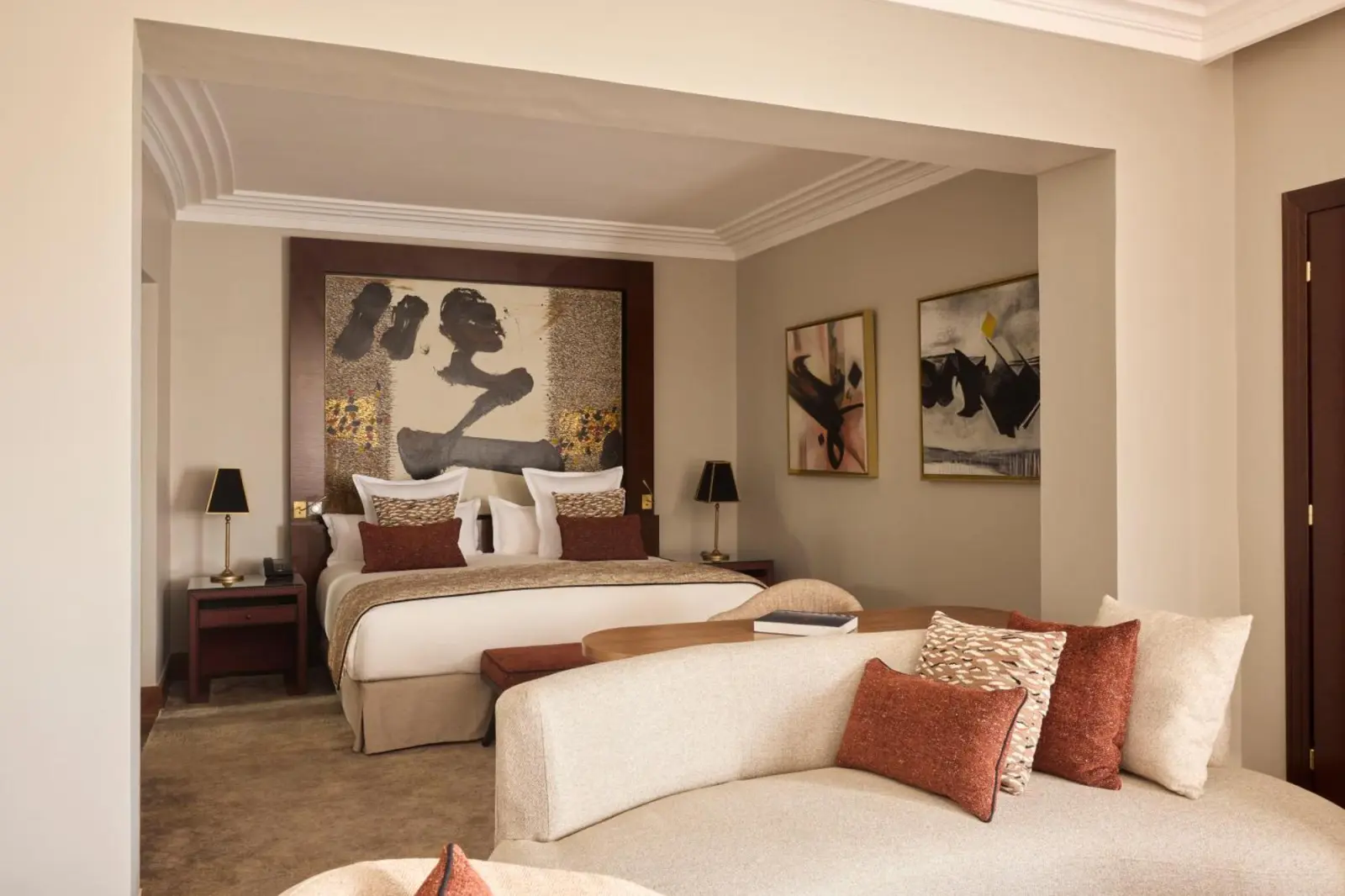 A spacious guest room in Nobu Hotel Marrakech featuring artistic touches and comfort.