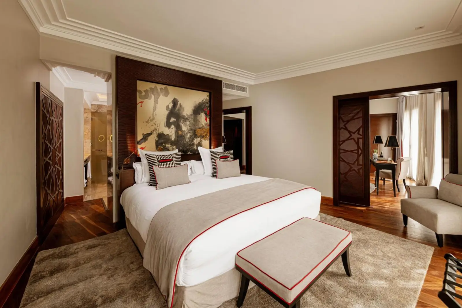 A well-furnished guest room at Nobu Hotel Marrakech with elegant artwork.