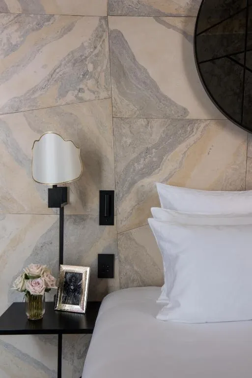 Bedside decor in guest room at Nolinski Venezia
