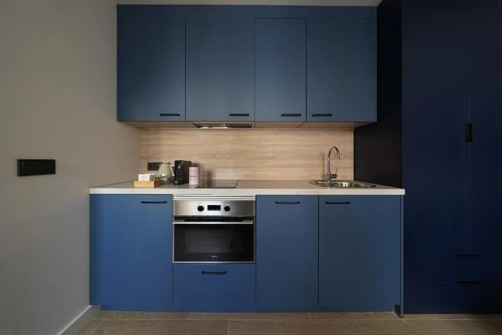 Blue kitchen in Numa Madrid Sol suite