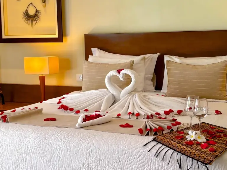 Romantic bed setup with flowers at Nyaman Villas Seminyak