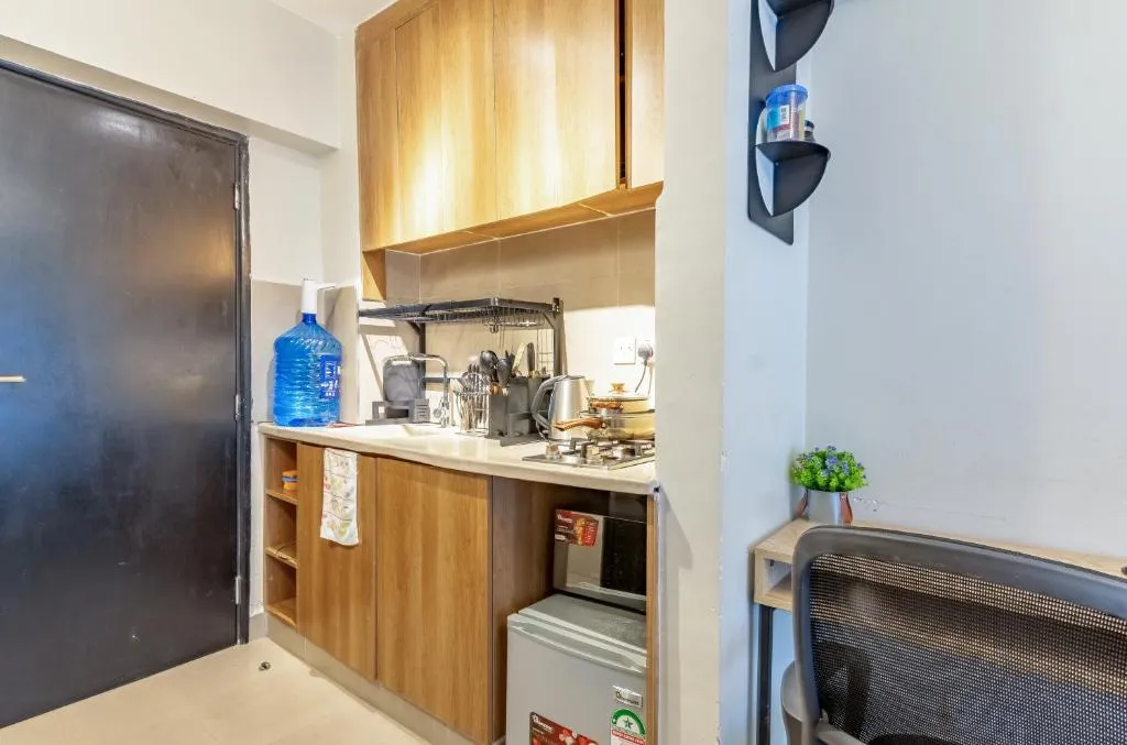 Kitchen area at Nyayo Studio in Nairobi with full amenities