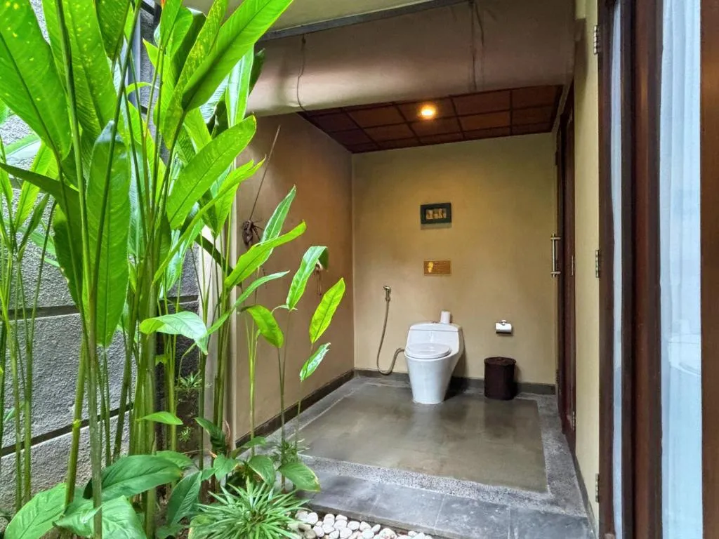Outdoor toilet area at Nyuh Bali Villas in Seminyak