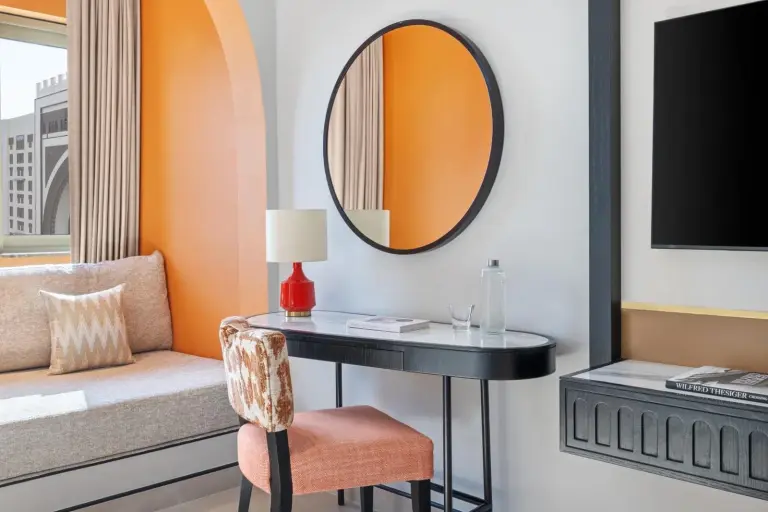 Close-up of decorative desk nook and window seat in Oaks Ibn Battuta Gate Dubai room