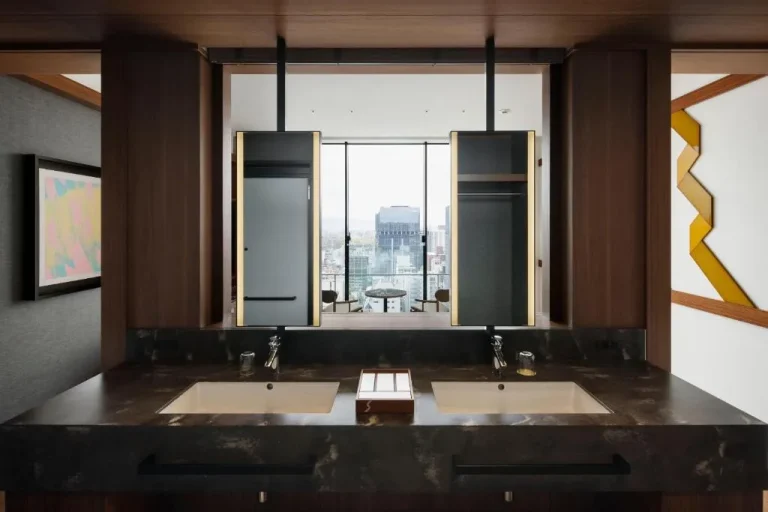 Bathroom with city view at One Fukuoka Hotel
