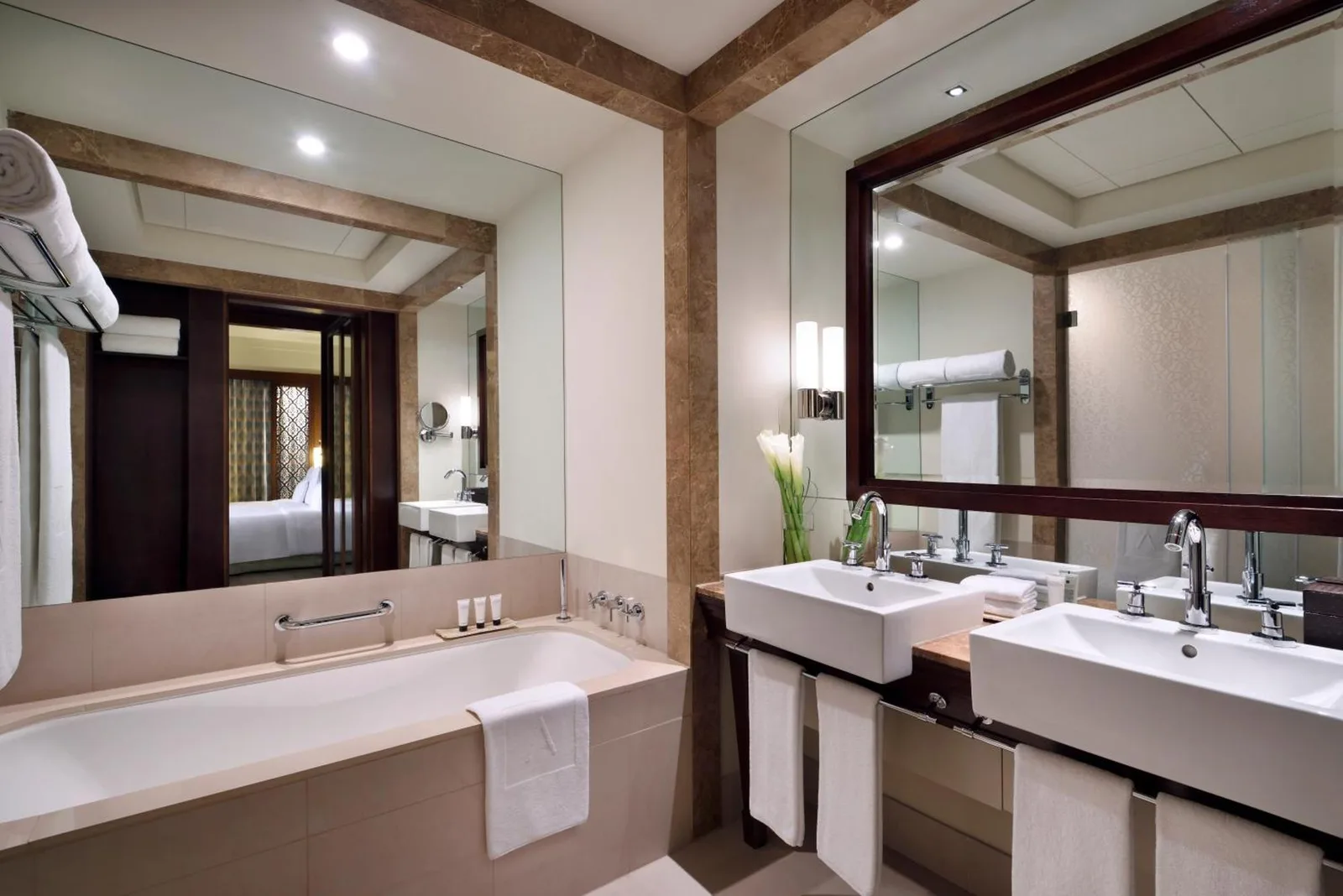 Palace Downtown – Dubai, United Arab Emirates hotel – a bedroom with a large white bed and a large window at Palace Downtown in Dubai