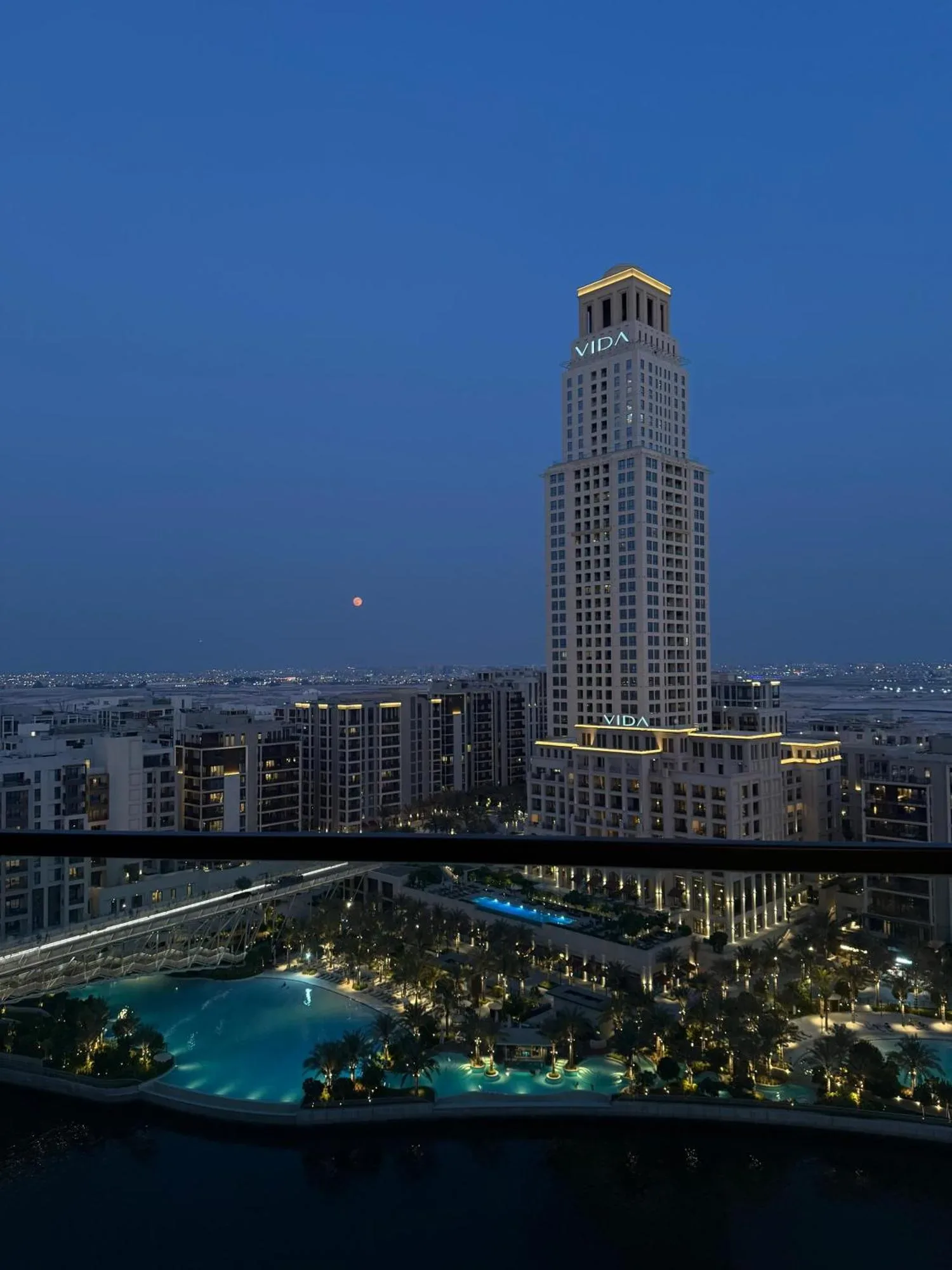 Sunset view of VIDA Hotel from Palace Dubai Creek Harbour