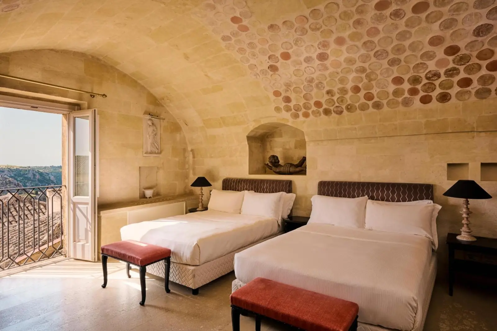 Family room with two beds at Palazzo Gattini - The Leading Hotels of the World in Matera
