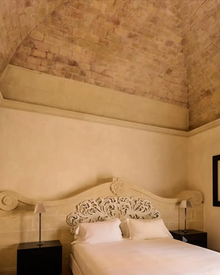 Unique bedroom with vaulted ceiling at Palazzo Gattini - The Leading Hotels of the World in Matera