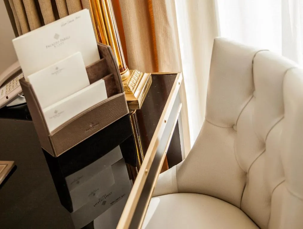 Palazzo Parigi Hotel & Grand Spa desk area with stationery