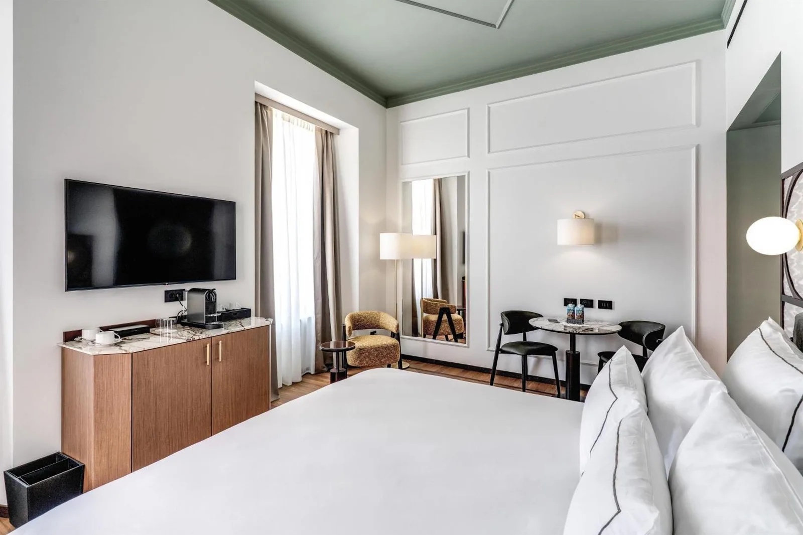 Habitación de huéspedes cómoda en Palazzo San Gottardo, Hotel Radisson Collection
