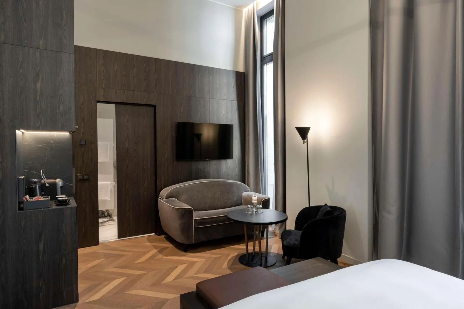 Palazzo Touring Club Milan, A Radisson Collection Hotel coin salon confortable dans une chambre