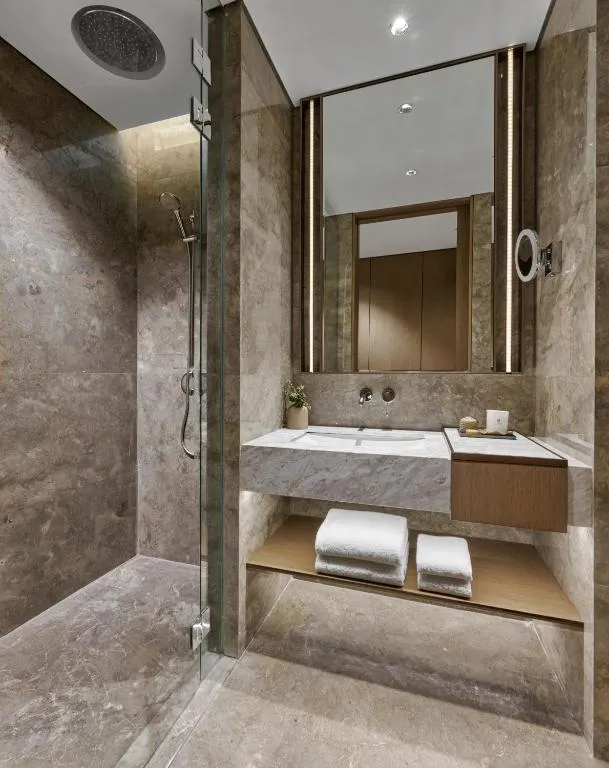 Shower area in luxurious bathroom at Pan Pacific Jakarta