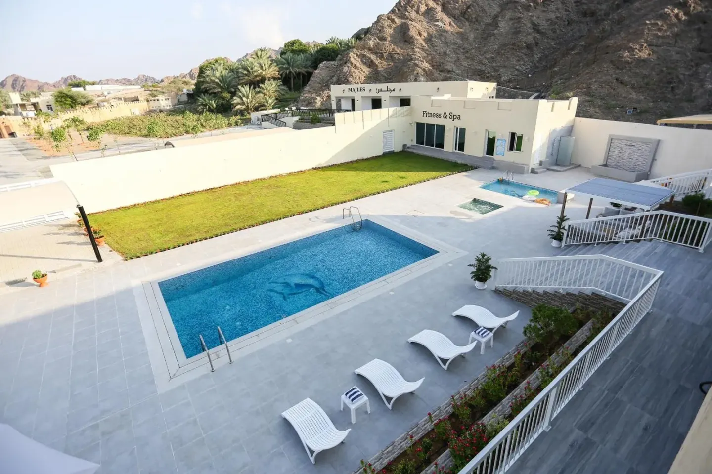 Outdoor pool area of Paradise Resort and Spa in Hatta