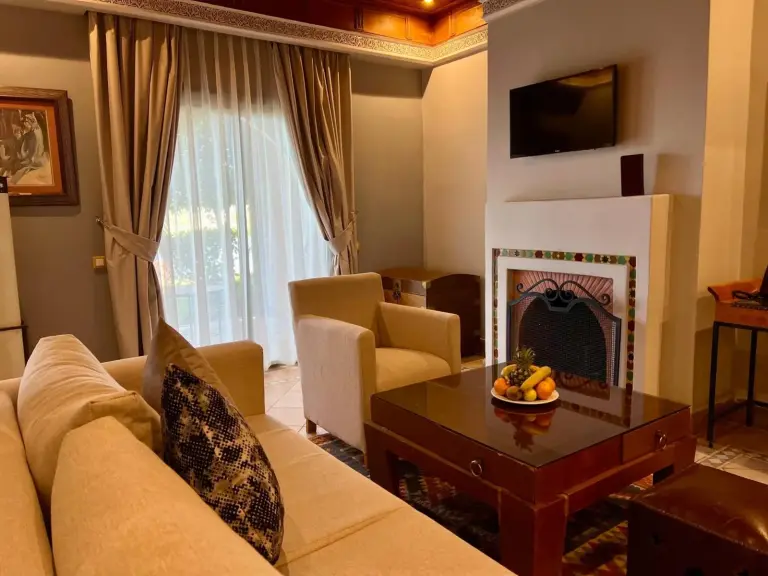 Seating area view in Pavillon du Golf - Palmeraie suite